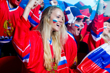 Smiling woman in stadium