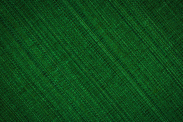 Fototapeta premium Green leather texture closeup, useful as background