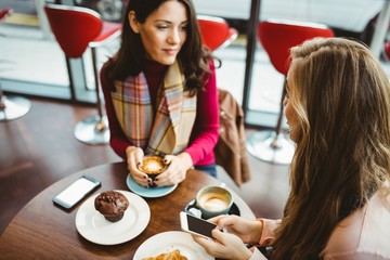 Friends using their smartphone