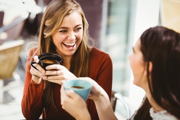 Friends chatting over coffee - 103623428