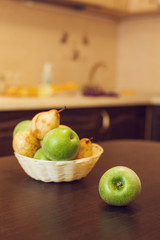 Young beautiful woman in checkered blue shirt and shorts making