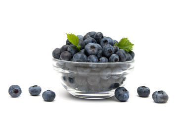 ripe blueberries closeup on a white background