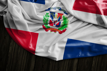 Dominican Republic flag on wooden table