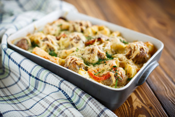 Vegetable casserole with potatoes and meatballs 
