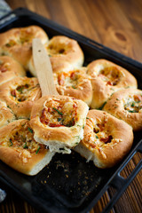 mini pizzas baked stuffed with cheese