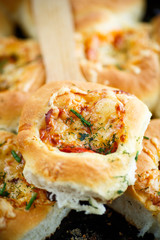 mini pizzas baked stuffed with cheese