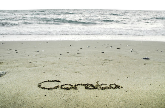 Corsica written in sand on the beach