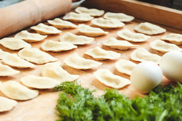 Vareniki (dumplings), pierogi before boiling - traditional Ukrainian food