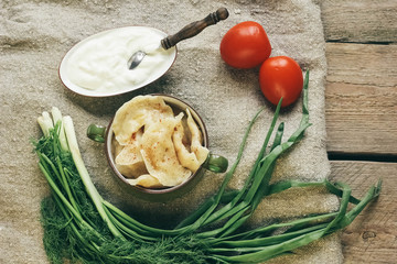Steamed meat dumplings, traditional pelmeni or varenyky dish