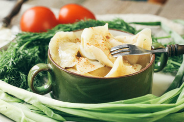 Steamed meat dumplings, traditional pelmeni or varenyky dish