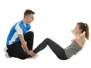 Obraz premium Teenagers doing abs crunches