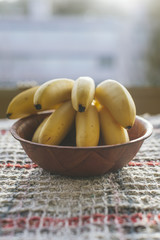 Mini Bananas in a Wooden Bowl