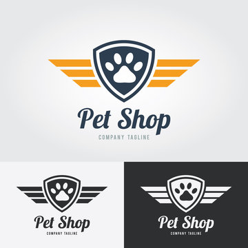 Pet shop logo template. Animal paw print Icon with shield and wings. Vector for pet shop, hotel, vet clinic.
