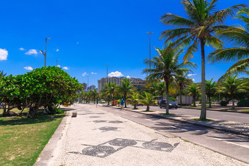 Fototapeta na wymiar Barra da Tijuca beach with mosaic of sidewalk in Rio de Janeiro. Brazil