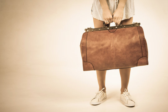 Closeup Woman Holding Hand Luggage, Weight And Baggage Dimensions