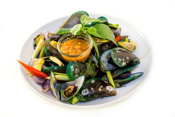 Steamed mussels with vegetables and sauce