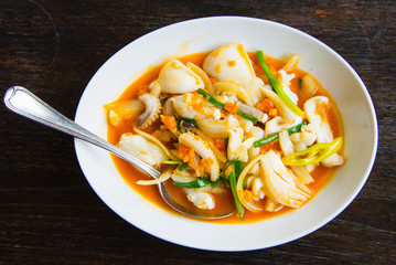 Stir fried squid with salted egg yolk (Thai Food)