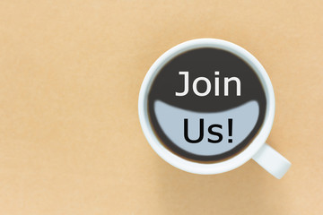 JOIN US message coffee cup and business strategy on wooden table with retro filter effect