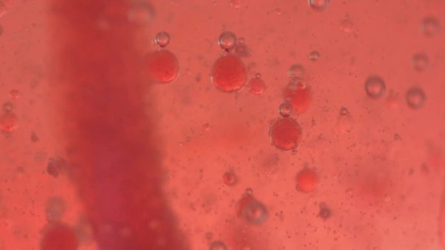 red fluid with bubles