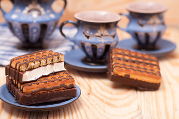 zephyr cookie with tea on wooden background
