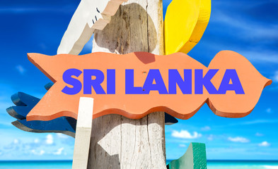Sri Lanka welcome sign with beach