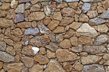 Old wall with stones, Sardinia, Europe