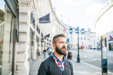 Hipster man in the streets of London, sunny day