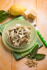 pasta with pesto sauce and parmesan flake