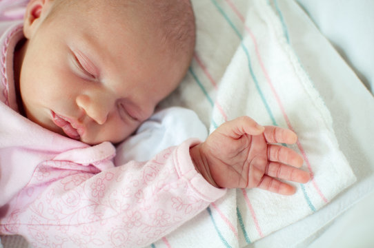 Hand of Sleeping Newborn Baby Girl
