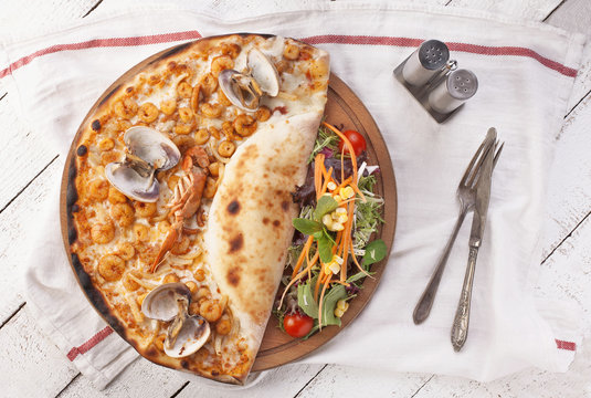 pizza with seafoods on a white background