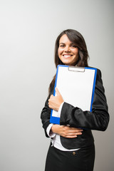 Naklejka premium woman in a business suit with a folder