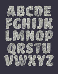 Vector alphabet, letters filled with pattern, white over black version