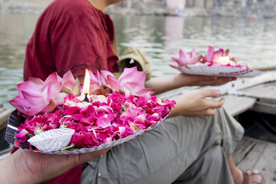 Gift for the dead people in Ganga River. Varanasi. India.