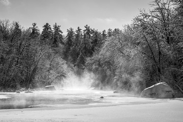 Fog rises into sunny sub-zero skies over the West fork of the Chippewa River in northern Wisconsin.