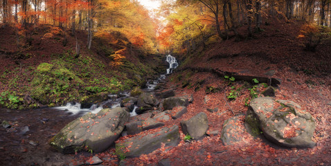 Waterfall at autumn forest