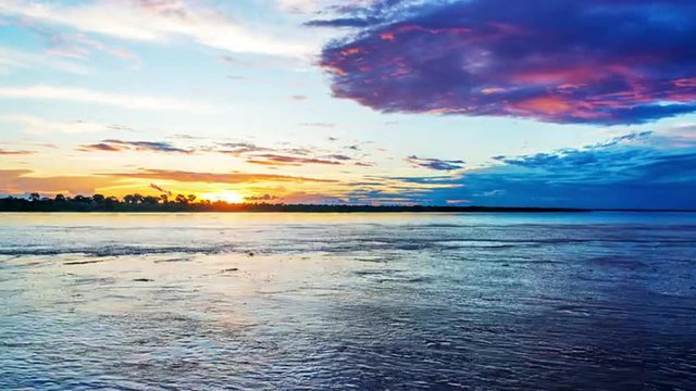 Sunset over the Amazon River seen near the border of Colombia and Brazil