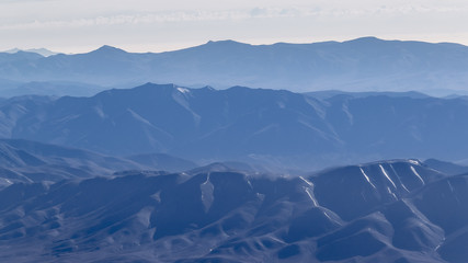 Fototapeta premium Window Plane View of Andes Mountains