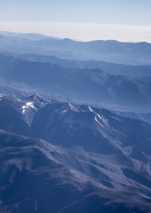Fototapeta na wymiar Window Plane View of Andes Mountains