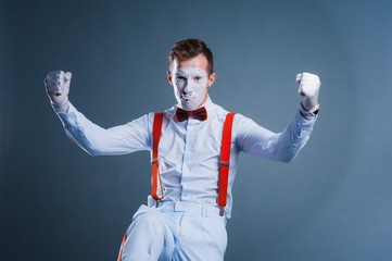  two funny mimes isolated on gray background