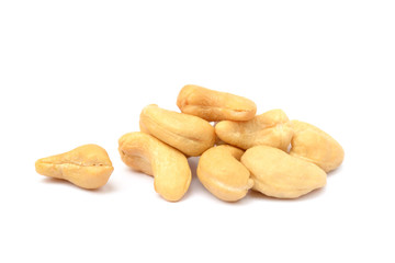 Tasty salted cashew nuts on a white background