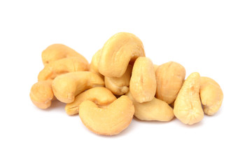 Tasty salted cashew nuts on a white background