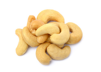Tasty salted cashew nuts on a white background