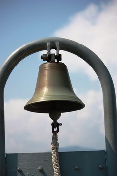 Golden ship's bell aboard