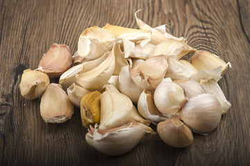 Group of garlic cloves on the wood