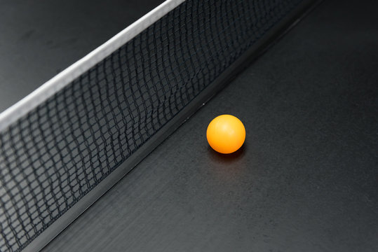 table tennis's ball on black table
