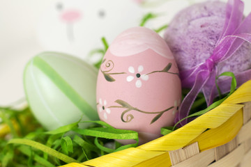 Beautiful colorful Easter eggs in a basket