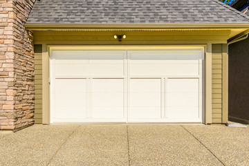 Luxury house with double garage door in Vancouver, Canada.