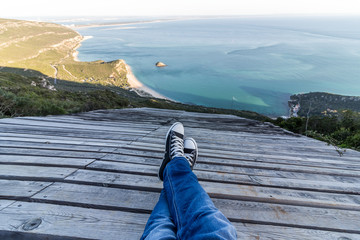 Legs relaxing watching the sea