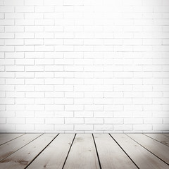 Room interior with brick wall and wooden floor