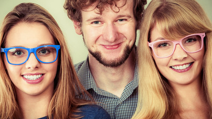 Happy friends man and women in glasses.